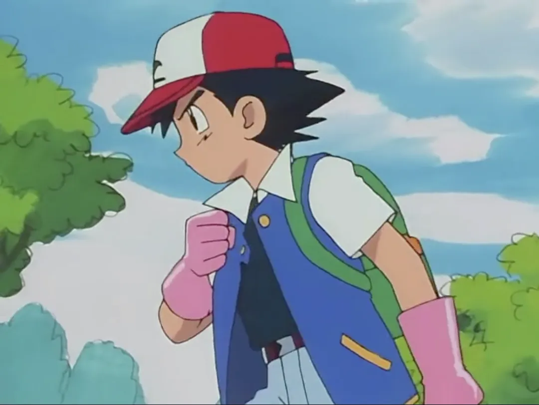 Ash wearing his mum's pink rubber gloves to protect from Pikachu's shocks